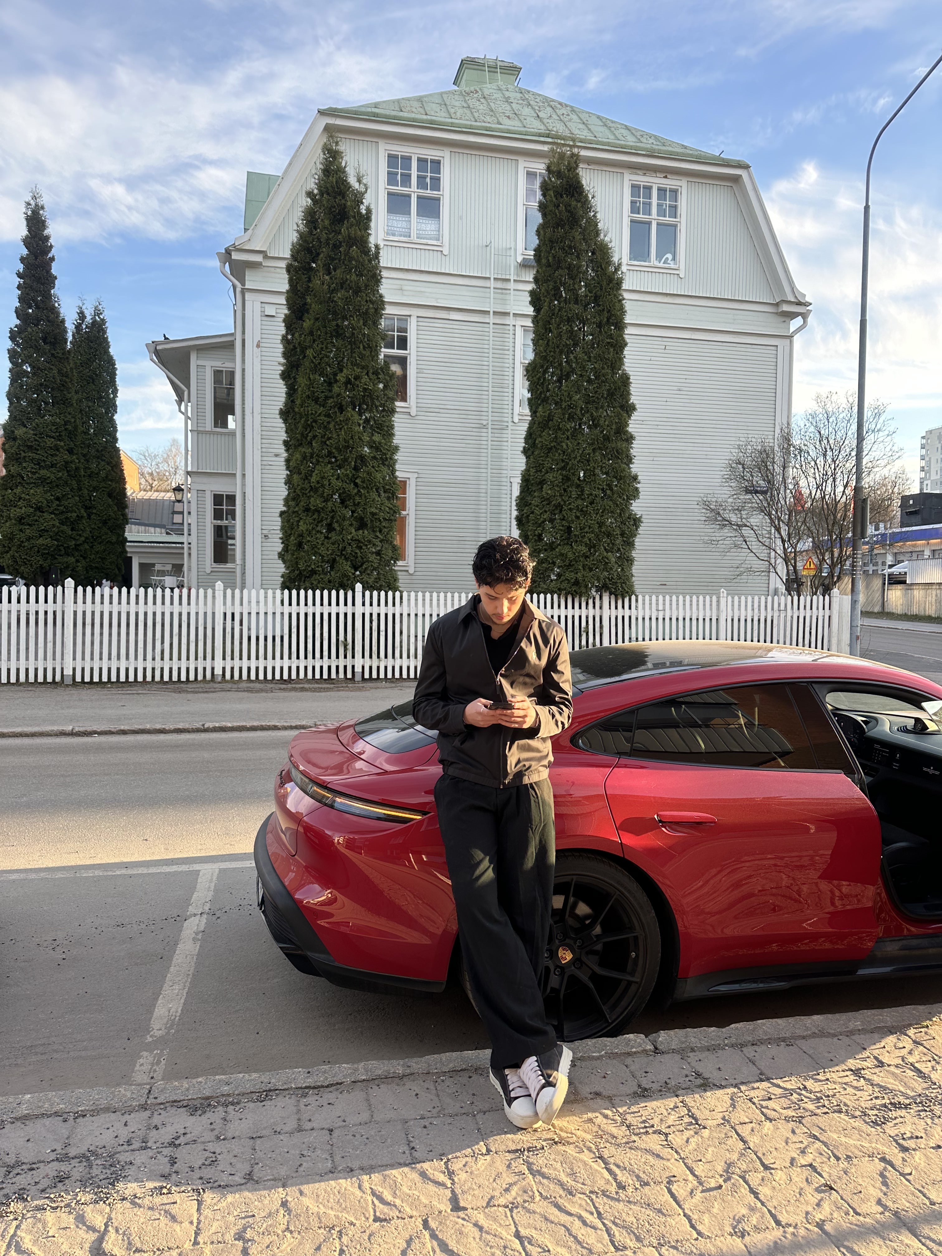 Bard Shala by his Porsche